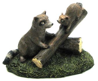 Resin Raccoons on Log